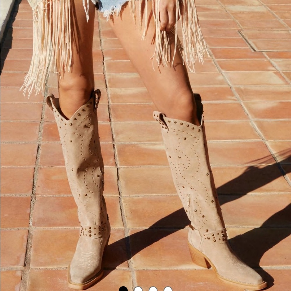 Suede studded knee high boots. Only two sizes on the site available to purchase